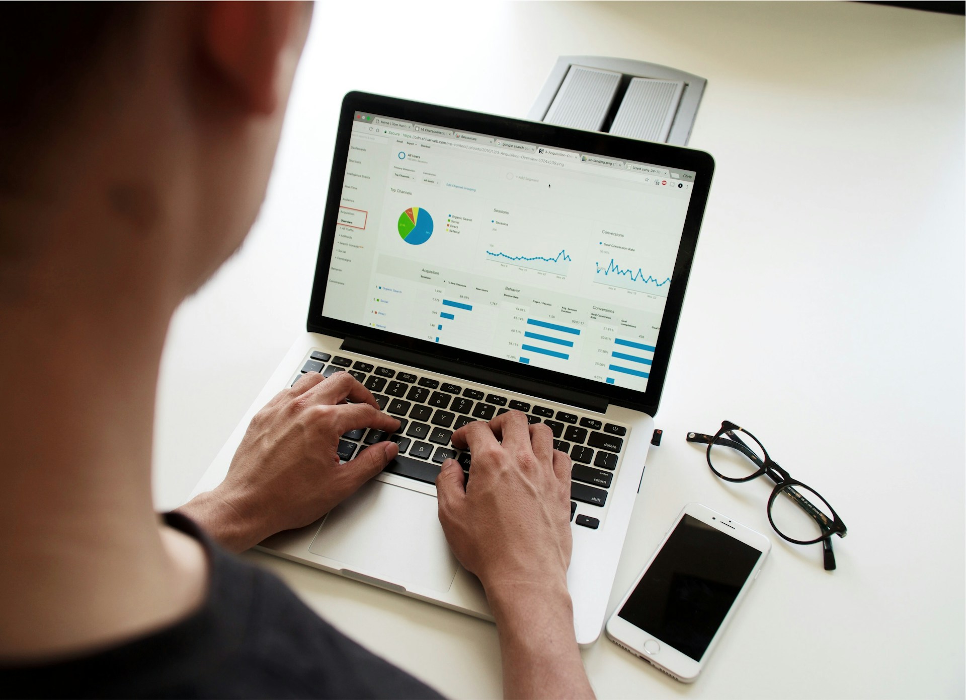 Person writing a marketing report